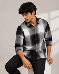 Black and white check overshirt - front seated view