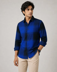 Blue and black check overshirt - front view with sunglasses