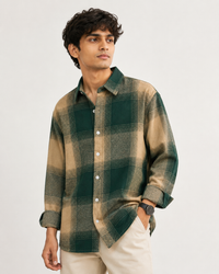 Green check overshirt - seated front view