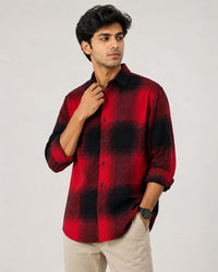 Red and black check overshirt - front seated view